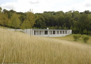 Despite being a far cry from a grand mansion or a stately home, the futuristic single-storey three-bedroom Fayland House near Henley-on-Thames, Oxfordshire, has beaten off competition from around the world to be crowned the best new home by The Architectural Review